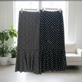 Black and white houndstooth and polka dot mermaid skirts plus size 1XL on hangers